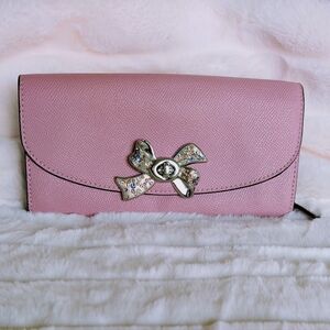 Coach Pink Wallet with Silver Bow Accent